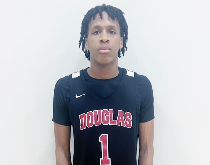 Senior Damerius Summers scored 22 points and added 14 rebounds to lead Majory Stoneman Douglas to 59-50 win over North Broward Prep on Tuesday.